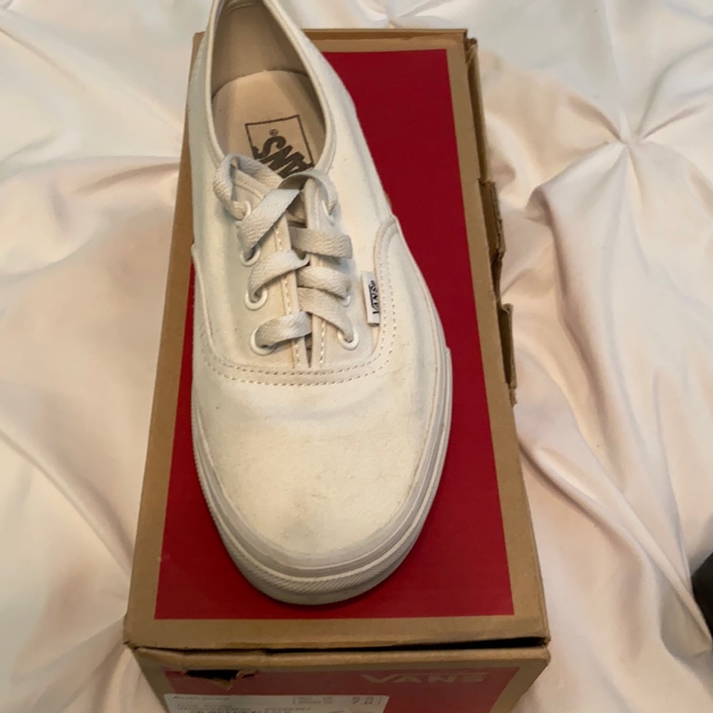 All white lace up vans